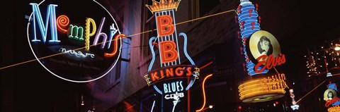 Framed Low angle view of neon signs lit up at night, Beale Street, Memphis, Tennessee, USA Print