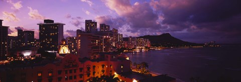 Framed Buildings lit up at dusk, Waikiki, Oahu, Hawaii, USA Print