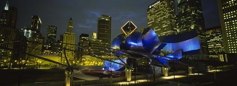 Framed Low angle view of buildings lit up at night, Pritzker Pavilion, Millennium Park, Chicago, Illinois, USA Print