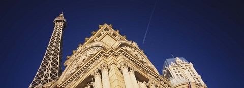 Framed Low angle view of a building in front of a replica of the Eiffel Tower, Paris Hotel, Las Vegas, Nevada, USA Print