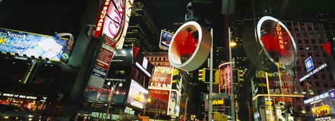 Framed Low angle view of buildings lit up at night, Times Square, Manhattan, New York City, New York State, USA Print