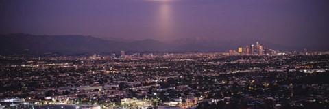 Framed Buildings in a city lit up at dusk, Hollywood, San Gabriel Mountains, City Of Los Angeles, Los Angeles County, California, USA Print