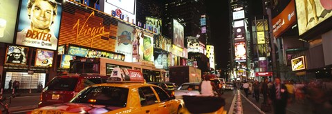 Framed Buildings lit up at night in a city, Broadway, Times Square, Midtown Manhattan, Manhattan, New York City, New York State, USA Print