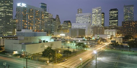 Framed Skyscrapers lit up at night, Houston, Texas Print