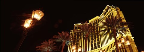 Framed Low angle view of a hotel lit up at night, The Strip, Las Vegas, Nevada, USA Print