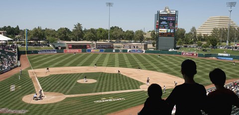 Framed Spectator watching a baseball match at stadium, Raley Field, West Sacramento, Yolo County, California, USA Print