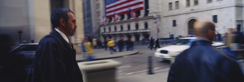 Framed Two people walking, New York Stock Exchange, Wall Street, Times Square, Manhattan, New York City, New York State, USA Print