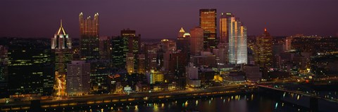 Framed High angle view of buildings lit up at night, Pittsburgh, Pennsylvania, USA Print