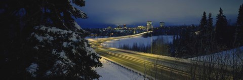 Framed Winding road running through a snow covered landscape, Anchorage, Alaska, USA Print