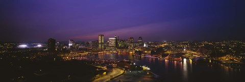 Framed Aerial view of a city lit up at dusk, Baltimore, Maryland, USA Print