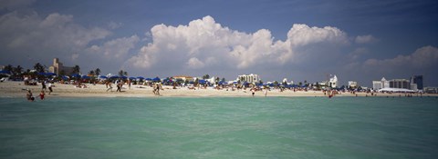 Framed Tourists on the beach, Miami, Florida, USA Print