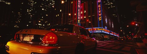 Framed Car on a road, Radio City Music Hall, Rockefeller Center, Manhattan, New York City, New York State, USA Print