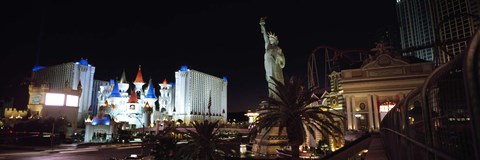 Framed Statue in front of a hotel, New York New York Hotel, Excalibur Hotel And Casino, The Las Vegas Strip, Las Vegas, Nevada, USA Print