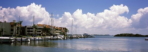 Framed Boats docked in a bay, Cabbage Key, Sunshine Skyway Bridge in Distance, Tampa Bay, Florida, USA Print