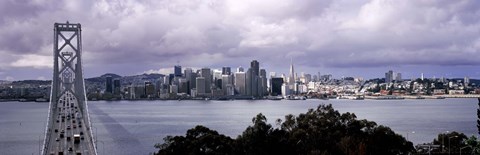 Framed Bridge across a bay with city skyline in the background, Bay Bridge, San Francisco Bay, San Francisco, California, USA Print
