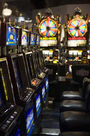 Framed Slot machines at an airport, McCarran International Airport, Las Vegas, Nevada, USA Print