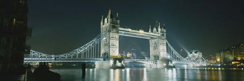 Framed Low angle view of a bridge lit up at night, Tower Bridge, London, England Print