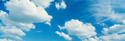 Framed Clouds against a pale blue sky Print