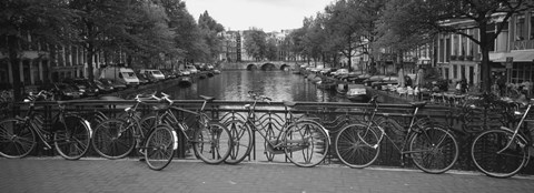 Framed Bicycle Leaning Against A Metal Railing On A Bridge, Amsterdam, Netherlands Print