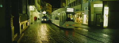 Framed Cable Cars Moving On A Street, Freiburg, Germany Print