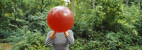 Framed Woman blowing a balloon, Germany Print