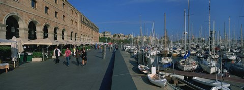 Framed Pedestrian walkway along a harbor, Barcelona, Catalonia, Spain Print