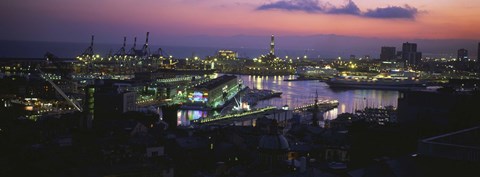 Framed High angle view of city at a port lit up at dusk, Genoa, Liguria, Italy Print