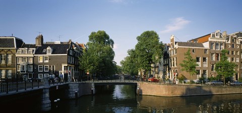 Framed Bridge across a canal, Amsterdam, Netherlands Print