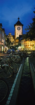Framed Bicycles parked along a stream near a road, Freiburg, Baden-Wurttemberg, Germany Print