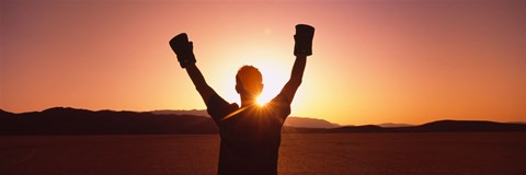 Framed Silhouette of a person wearing boxing gloves in a desert at dusk, Black Rock Desert, Nevada, USA Print