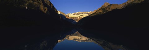 Framed Reflection of mountains in a lake, Lake Louise, Banff National Park, Alberta, Canada Print