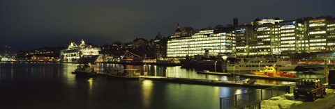 Framed Buildings in a city lit up at night, Sodermalm, Slussplan, Stockholm, Sweden Print