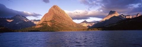 Framed Sunlight falling on mountains at the lakeside, Swiftcurrent Lake, Many Glacier, US Glacier National Park, Montana, USA Print