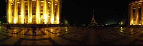Framed Buildings lit up at night with a tower in the background, Eiffel Tower, Paris, France Print