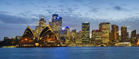 Framed Opera house and buildings lit up at dusk, Sydney Opera House, Sydney Harbor, Sydney, New South Wales, Australia Print