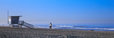 Framed Rear view of a surfer on the beach, Santa Monica, Los Angeles County, California, USA Print