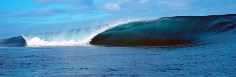 Framed Small waves in a dark blue sea Print