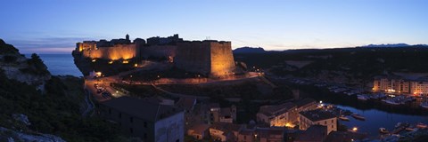 Framed Castle lit up at night, Bonifacio Harbour, Corsica, France Print