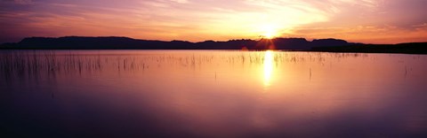 Framed Reflection of sun on water at dawn, Elephant Butte Lake, New Mexico, USA Print