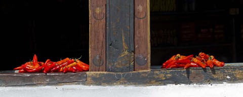 Framed Red chilies drying on window sill, Paro, Bhutan Print
