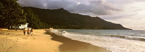 Framed People walking along the Beau Vallon beach, Mahe Island, Seychelles Print