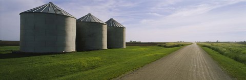 Framed Three silos in a field Print
