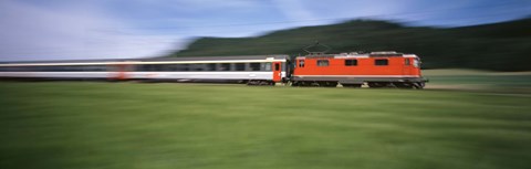 Framed Train moving on a railroad track Print