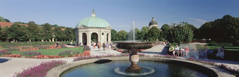 Framed Germany, Munich, Hofgarten, Tourist sitting in the park Print