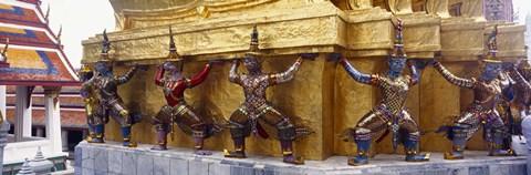 Framed Statues at base of golden chedi, The Grand Palace, Bangkok, Thailand Print