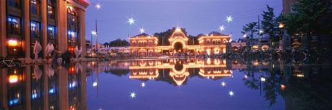 Framed Buildings in an amusement park lit up at dusk, Tivoli Gardens, Copenhagen, Denmark Print