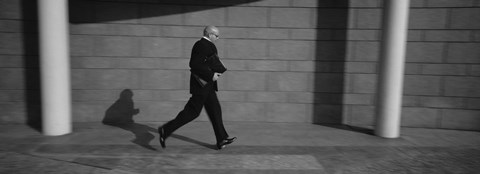 Framed Side Profile Of A Businessman Running With A Briefcase, Germany Print