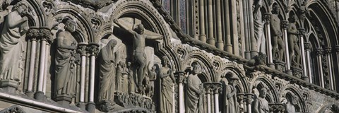 Framed Low angle view of statues carved on wall of a cathedral, Trondheim, Norway Print