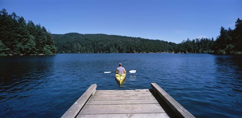 Framed Rear view of a man on a kayak in a river, Orcas Island, Washington State, USA Print