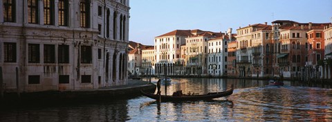 Framed Man on a gondola in a canal, Grand Canal, Venice, Italy Print